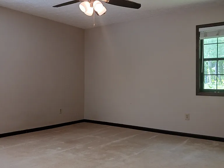 Master bedroom can fit king-size bed and 2 dressers.