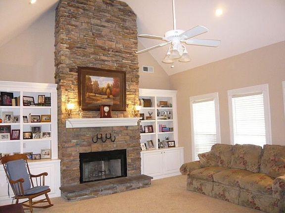 Stacked stone fireplace in family room
