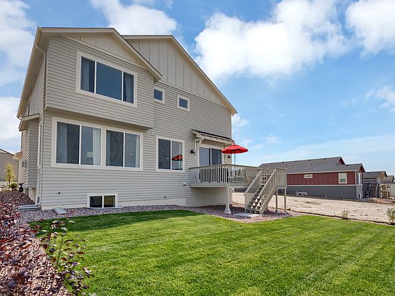 Exterior Rear with Deck Photo representing home to be built and may demonstrate optional features