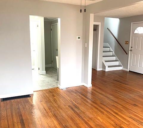 View from Dining Room/Living Room through to laundry area and half bath