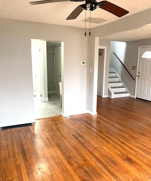 View from Dining Room/Living Room through to laundry area and half bath