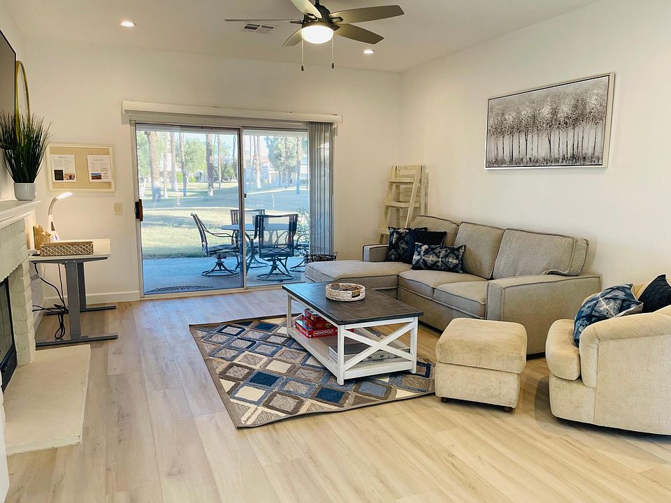 Such a beautiful living space with a private patio and plenty of grass area to play! Easy access to the pool, only about 100 feet away!