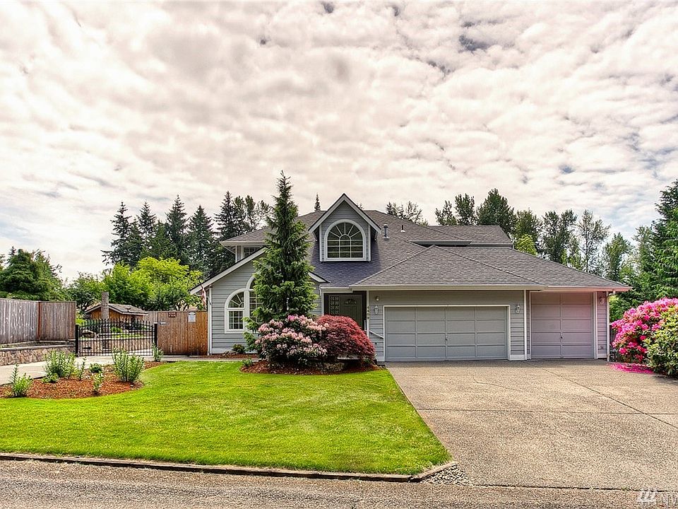 Spectacular Park-Like Property!  Oversized 3rd Garage!  Over 1/2 Acre!