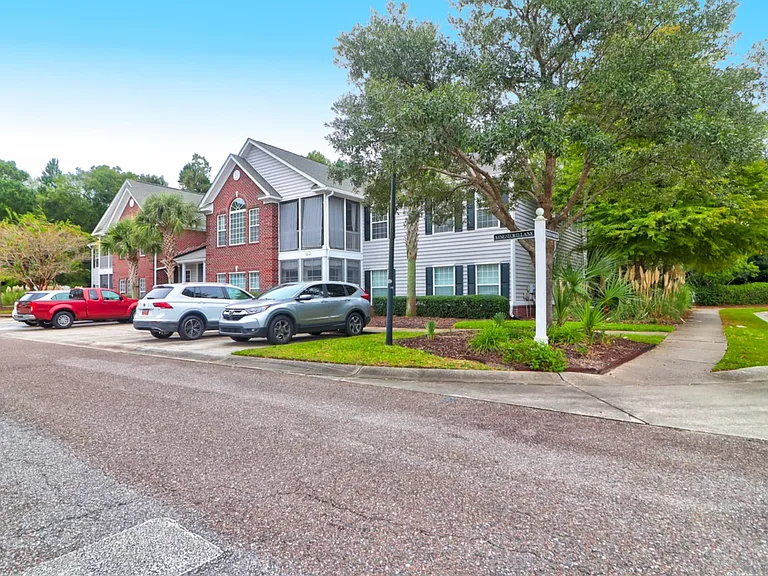 Cul-de-sac's parking lot easily accommodates all residents; this photo shows only the spots directly in front of the building.