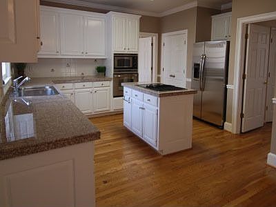 Remodeled kitchen with s/steel appliances, center island, Jenn Air cooktop 