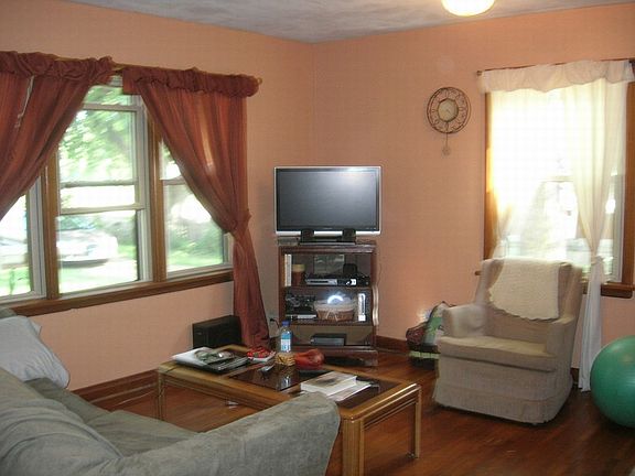 Spacious Living Room with Hardwood Floors