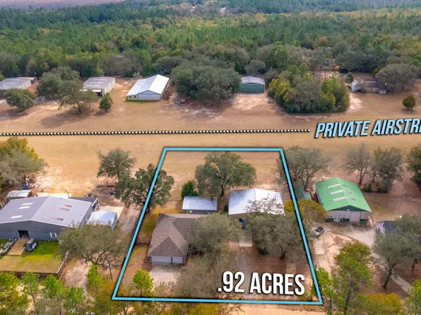 526 Tail Spin Dr, Holt, FL 32564