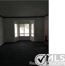 Family room, living room and finished basement with kitchene