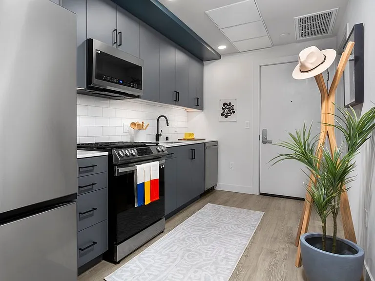 Finish Package II Kitchen with stainless steel appliances and hard-surface flooring