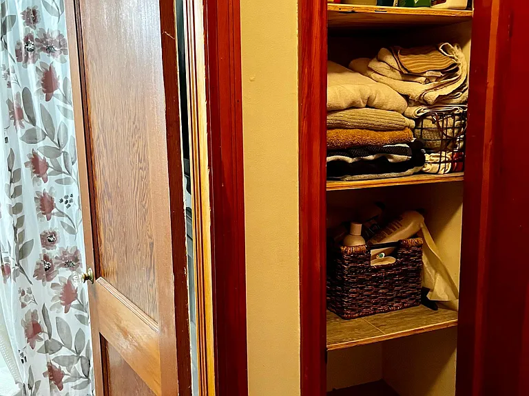 Bathroom shelving for towels/ toiletries.