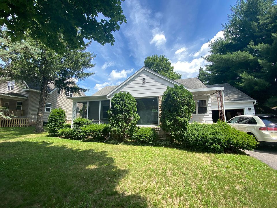 Single Family Cape Code with 3 Season Room
