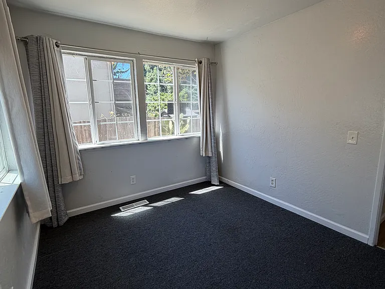 the following photos are of the downstairs bedrooms and bathroom