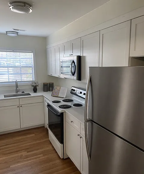 Kitchen is currently having NEW white cabinets & quartz counters installed!!