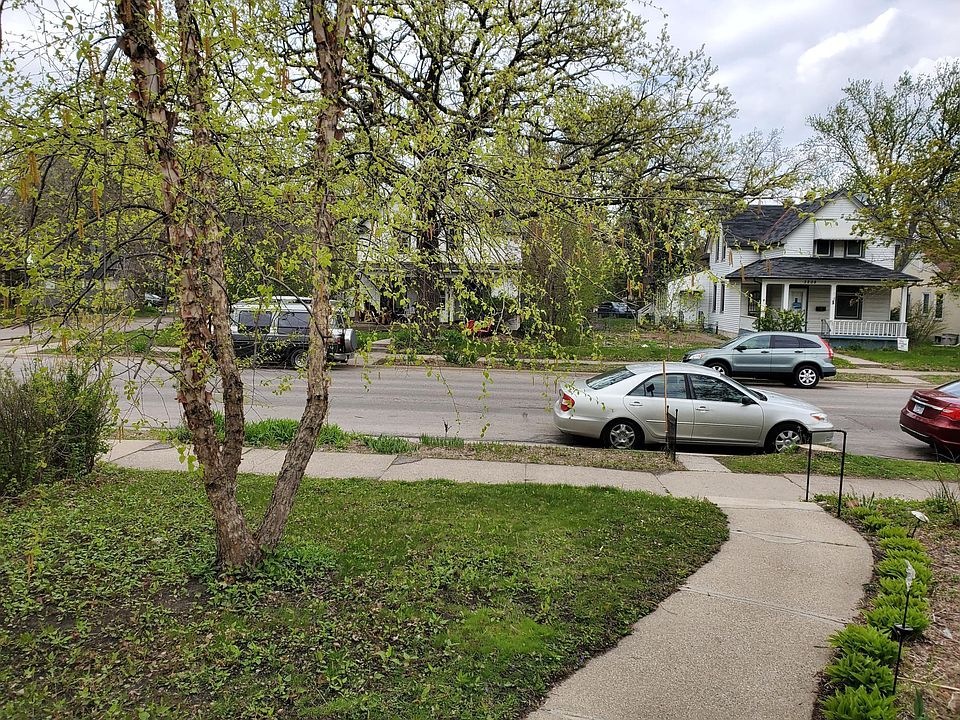 view out front door, early May, neighbor's houses across the street