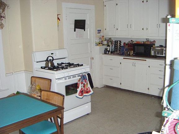 Kitchen from laundry door. BR 4 rear left door