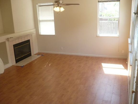 family room w/wood burning place