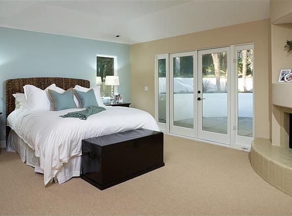 Large masterbedrom with fireplace