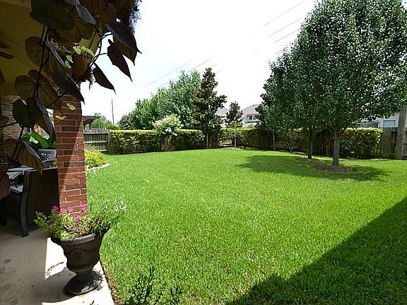 Large pool sized fully fenced backyard.