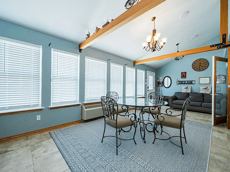 sunroom with view of the pool