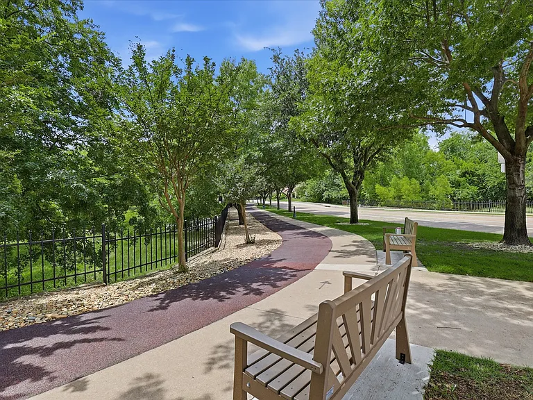 Dr. Kenneth Cooper Park just steps away This green space features a dedicated, dual-surface walking and jogging trail designed for maximum comfort and safety. Utilize the smooth concrete walkway or the specialized, impact-absorbing rubberized track.
