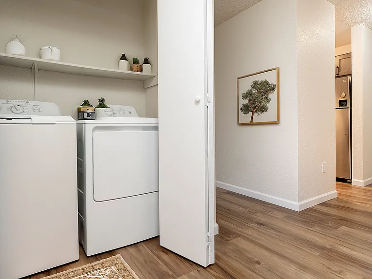 Efficient laundry nook blending style and functionality. Efficient laundry nook blending style and functionality.