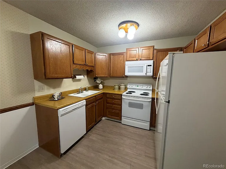 3144 S Wheeling Way #311 — Photo 1