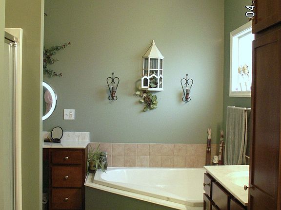 Master Bath w/shower, soaking tub, his & hers sink, linen tower & vanity