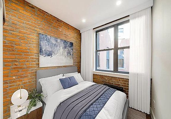 4th image of 150 E 2nd St Penthouse A