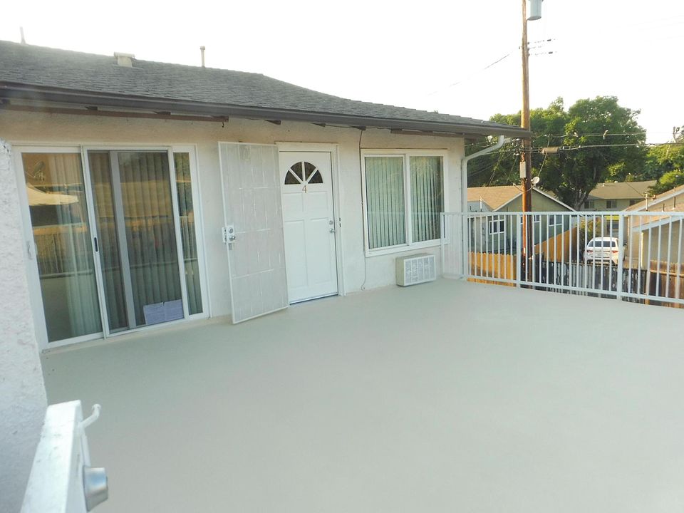 deck overlooking alley and homes to the north
