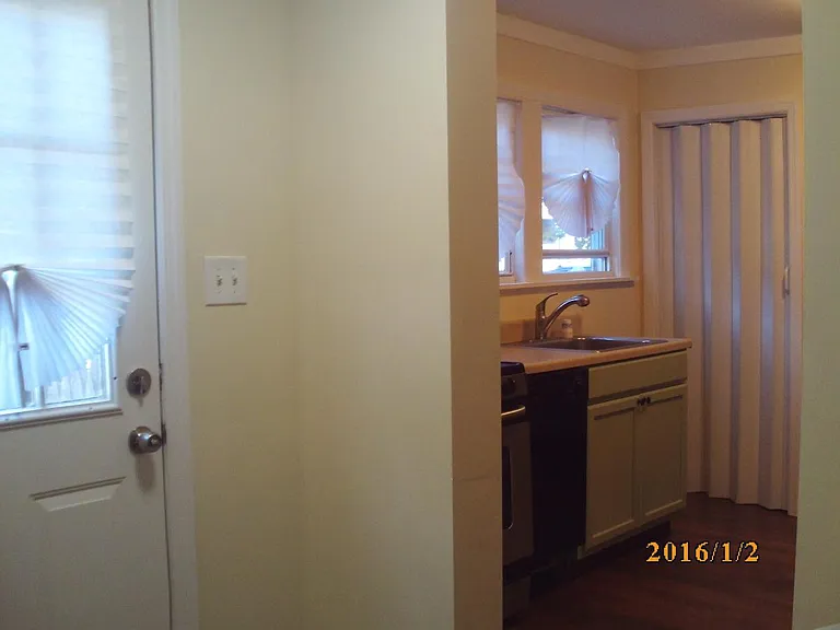 2nd entrance, exit leading to yard