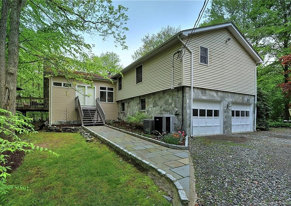 Welcome to this beautifully maintained bi-level contemporary nestled on 1.14 acres within quiet, desirable neighborhood at the end of a cul-de-sac.