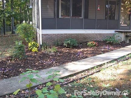Landscaping on right front side of house