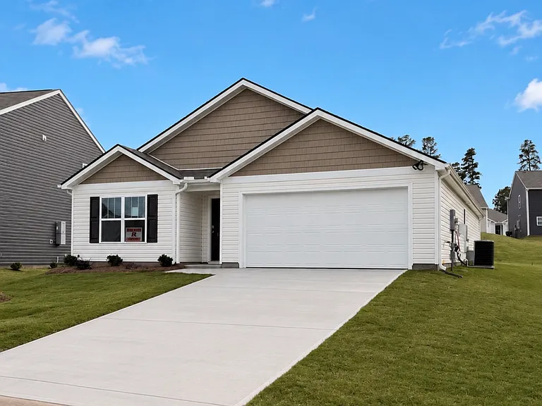 features 2 full baths , 2 car garage