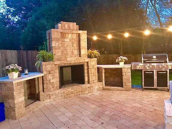 PATIO FIREPLACE AT NIGHT