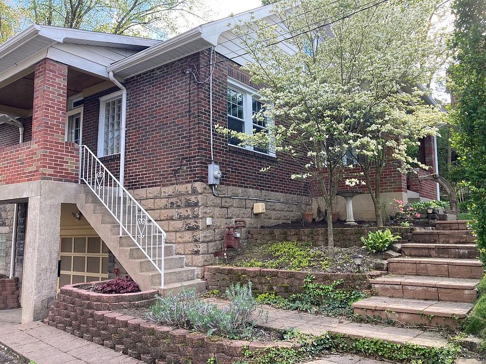 Main Entrance, among dogwoods, azaleas, lavender and hostas