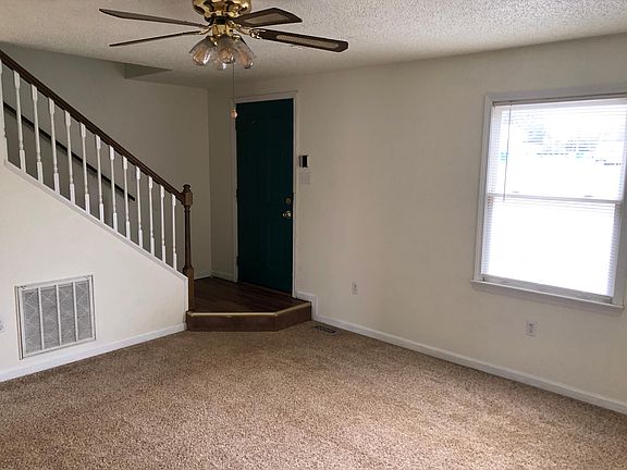 Living room, front door & front window.