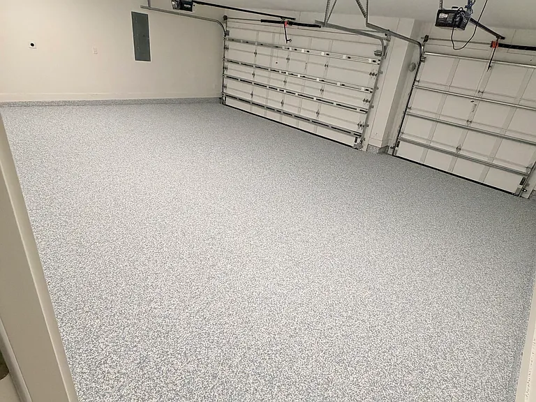 Clean 3-car garage with ample parking and storage space