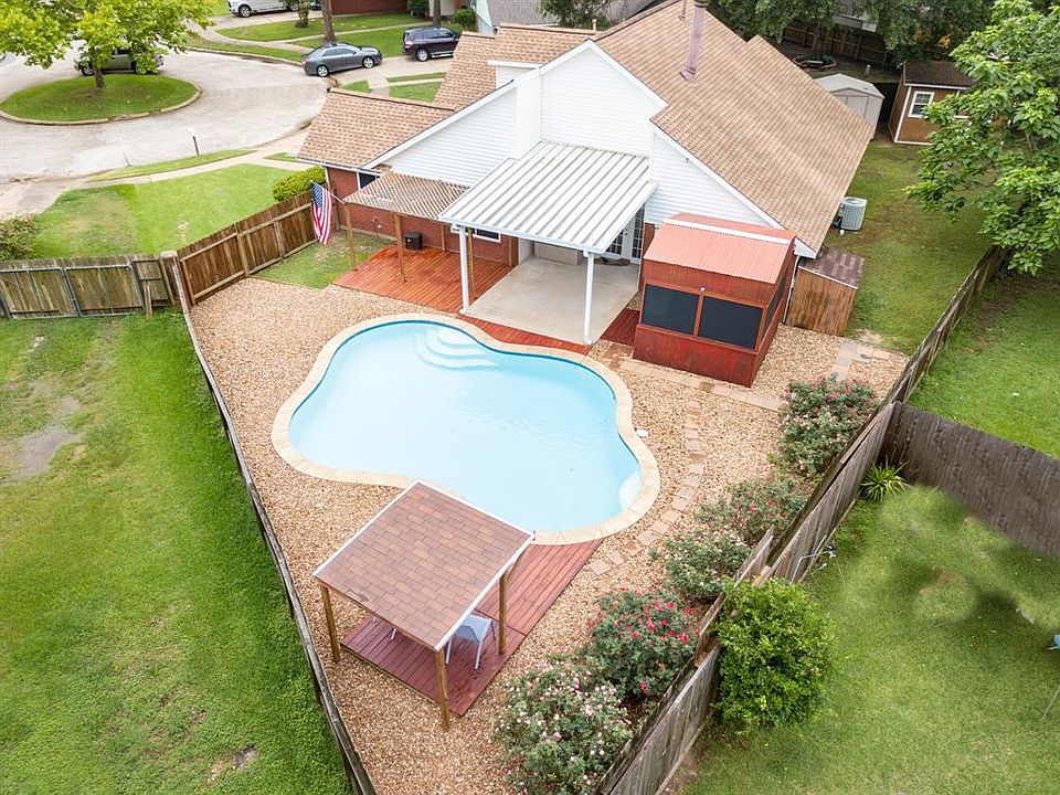 What a rare find! This three bedroom, 2 bath home is located on a cul-de-sac and offers a true backyard paradise!