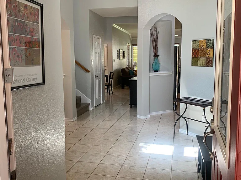 Entry hall with view of upstairs loft area make this home inviting and open!