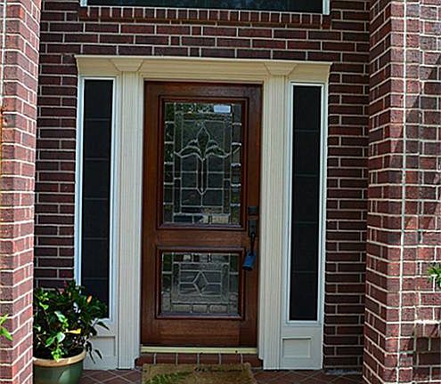 Freshly stained front door! Tons of brick on this home, easy maintenance!