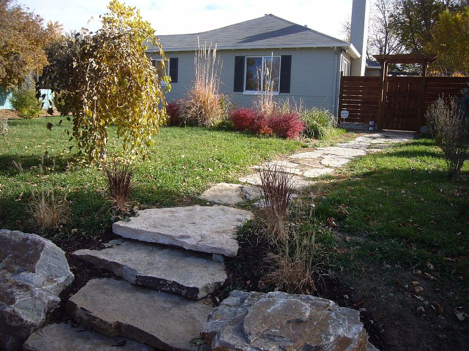 Walkway from Sidewalk leading up to Front Gate Entrance
