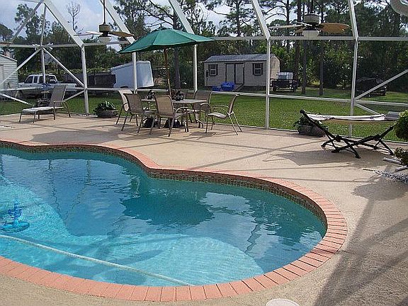 OTHER PIC OF POOL AREA AND DECKING