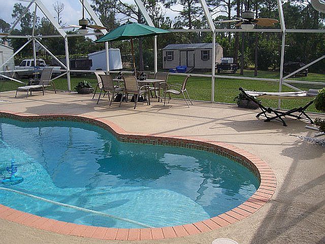 OTHER PIC OF POOL AREA AND DECKING