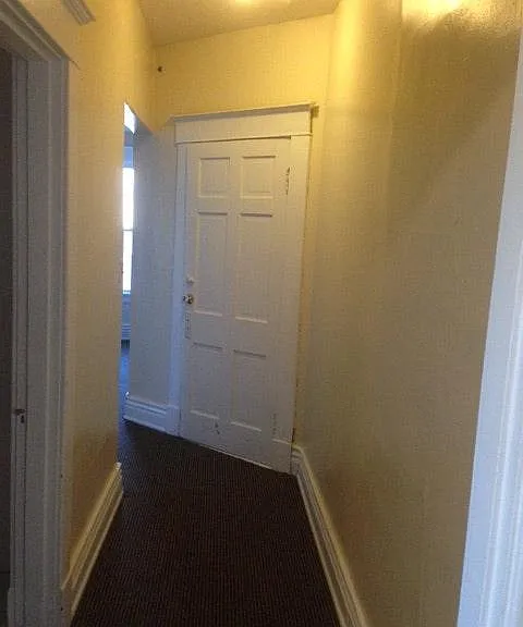 Hallway facing new front door