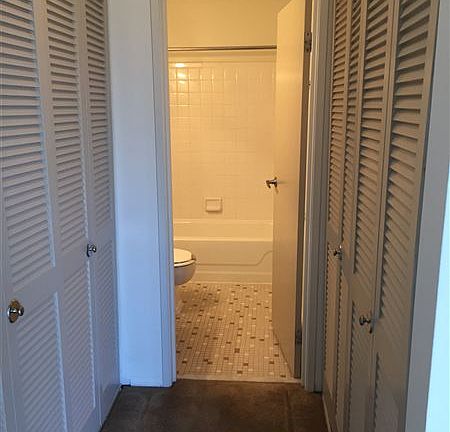 2 closets in hallway to bathroom