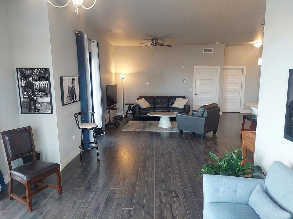 Looking at living room and patio door from outside door entry way