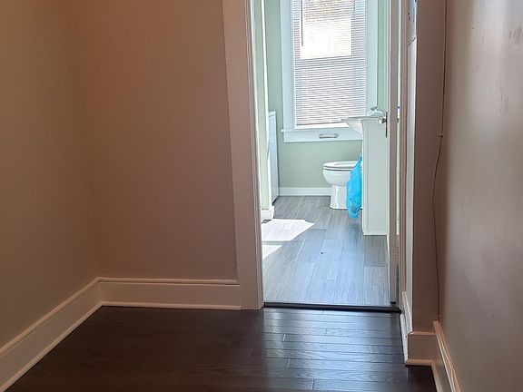 Top of the stairs viewing the bathroom