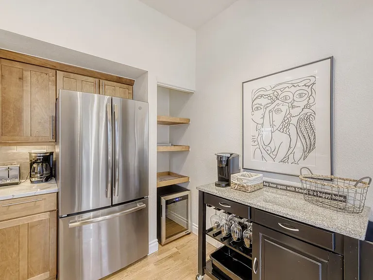 Coffee and wine Bar and 24 bottle wine cooler.
