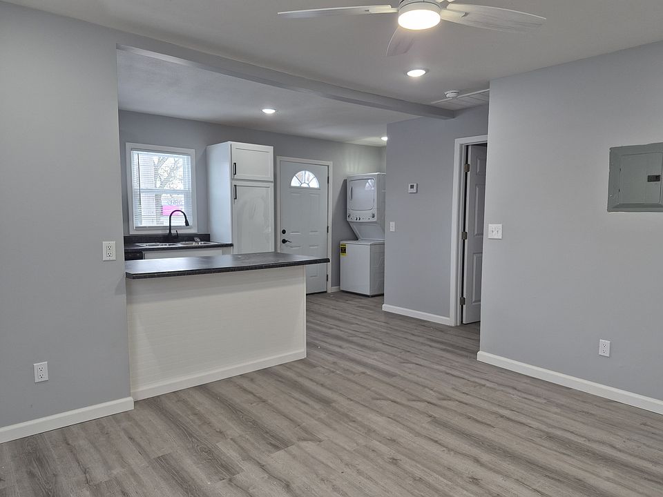 living room and door to bedroom
