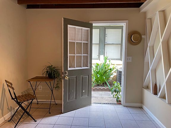 From inside, view of front door opened.